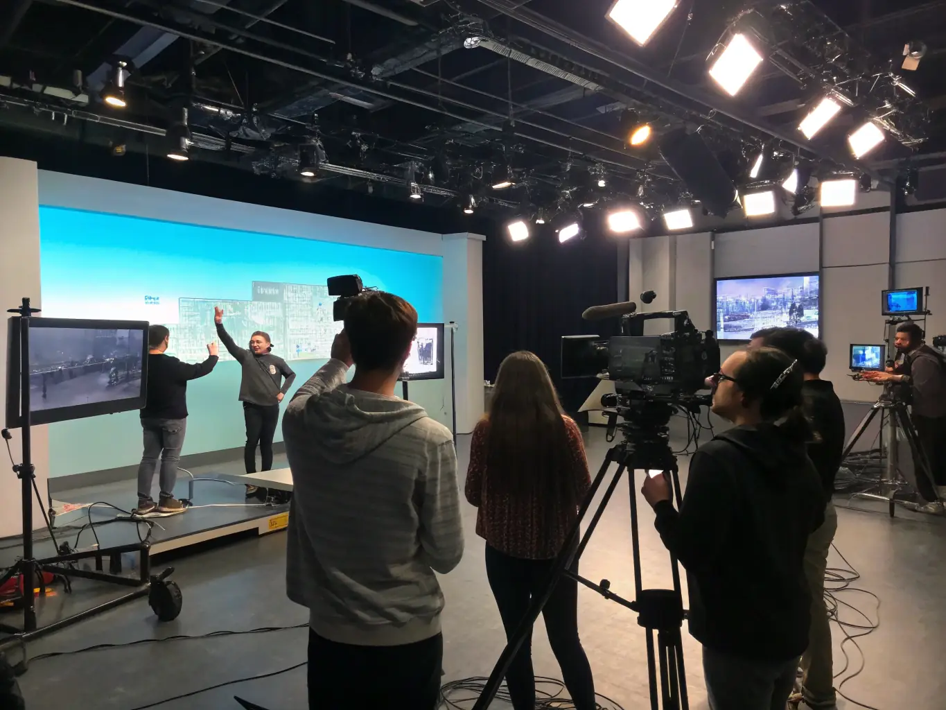 Children filming and editing videos with professional equipment, guided by mentors, illustrating the MCN Content Production & IP Incubation program at Kidpreneur Land.